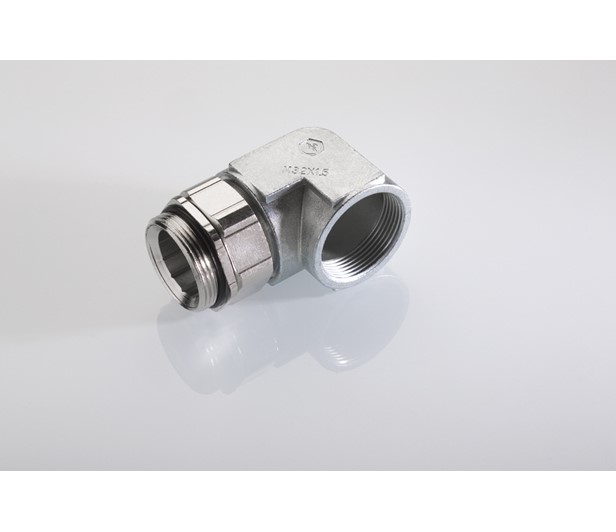 The object in the image is a Pflitsch angle with coupling, which is a type of cable gland used to guide cables into enclosures or control cabinets at a 90-degree angle. It is designed to provide strain relief, ensuring that cables are securely held and protected from damage. 